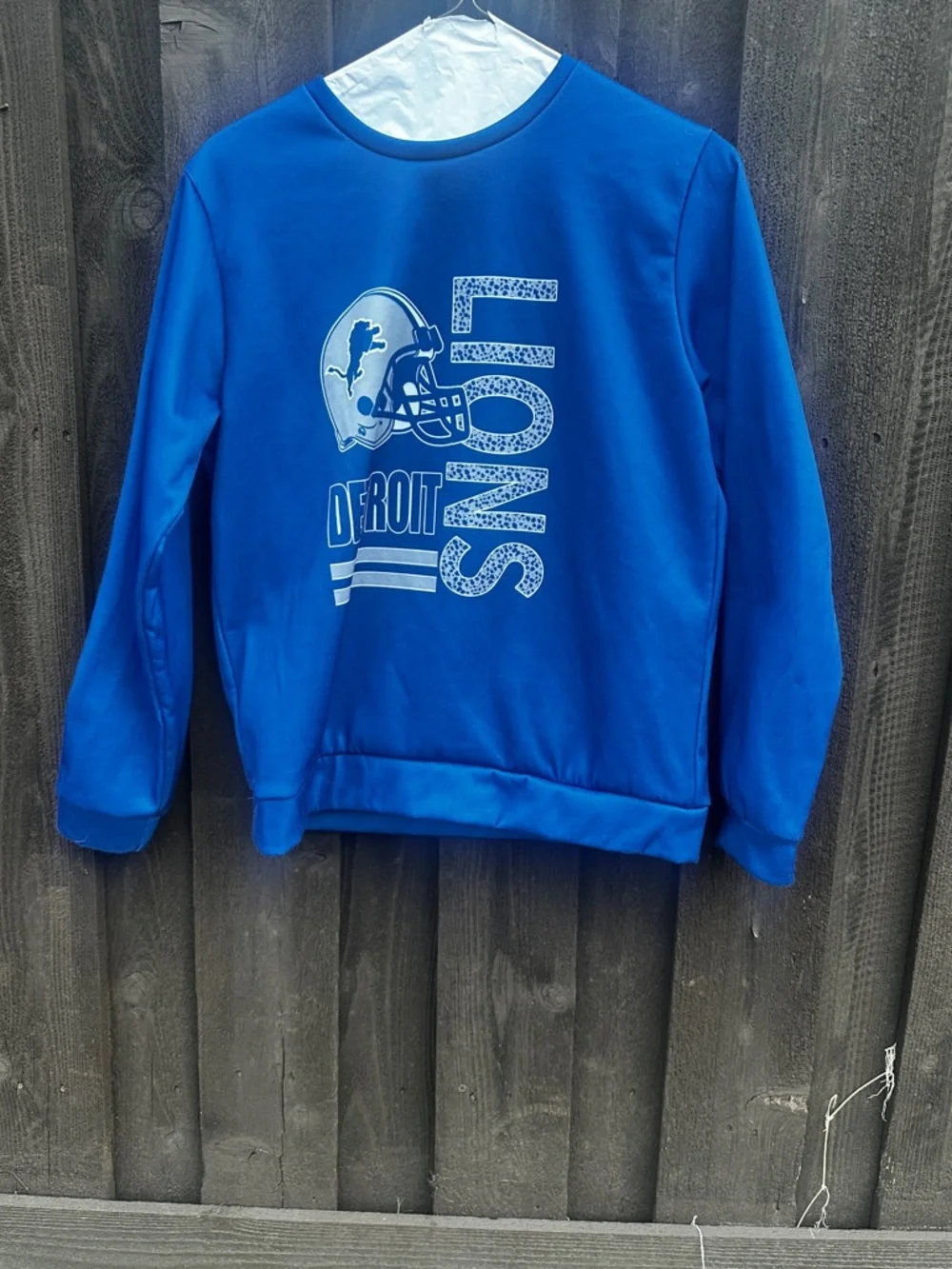 Detroit Lions sweatshirt EUC blue sheen white fleece interior women's medium